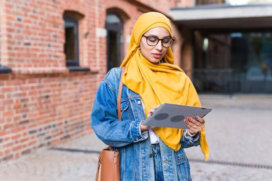 Student calculating paying off her student loans