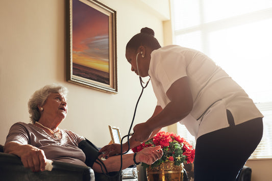 nurse caring for long term care patient