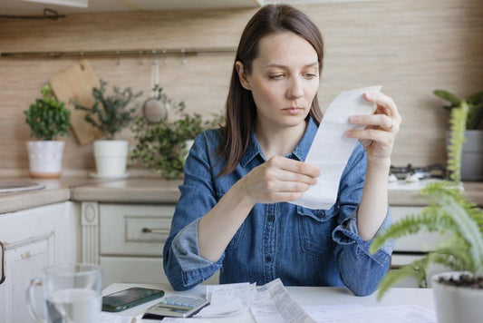 women reading finance charge on your loan