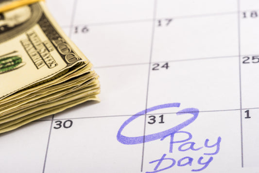 pay day circled for someone living paycheck to paycheck