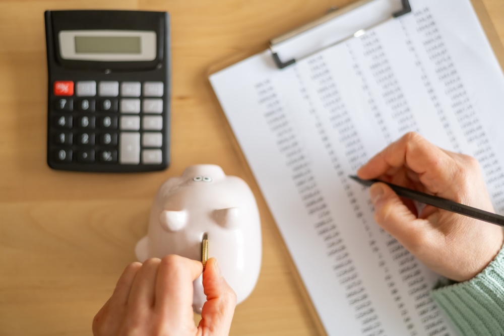 Person calculating expenses