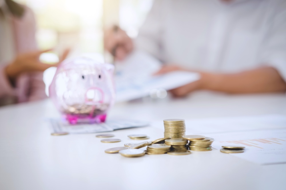 Couples discussing financials and savings