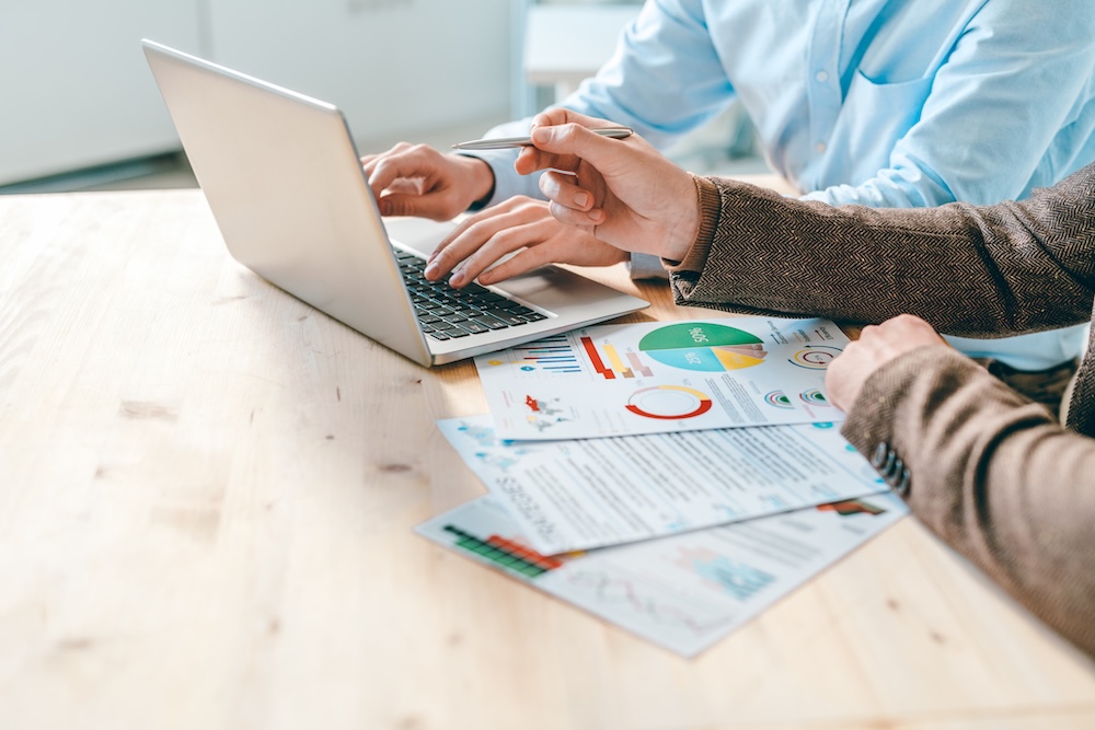 Business people looking at a credit report