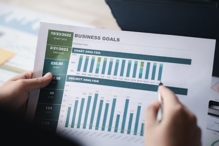 Business person looking at financial trends and goals