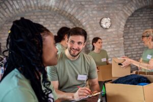 Volunteers working together at a community charity