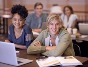 Young students studying at a laptop