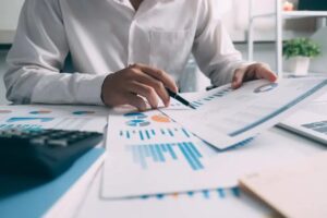 Person looking over mutual funds