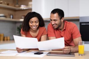 couple reviewing their personal finance liabilities