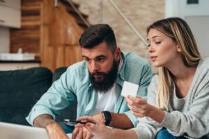 Couple evaluating personal finance software together