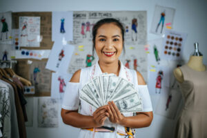 woman showing off her passive income earnings