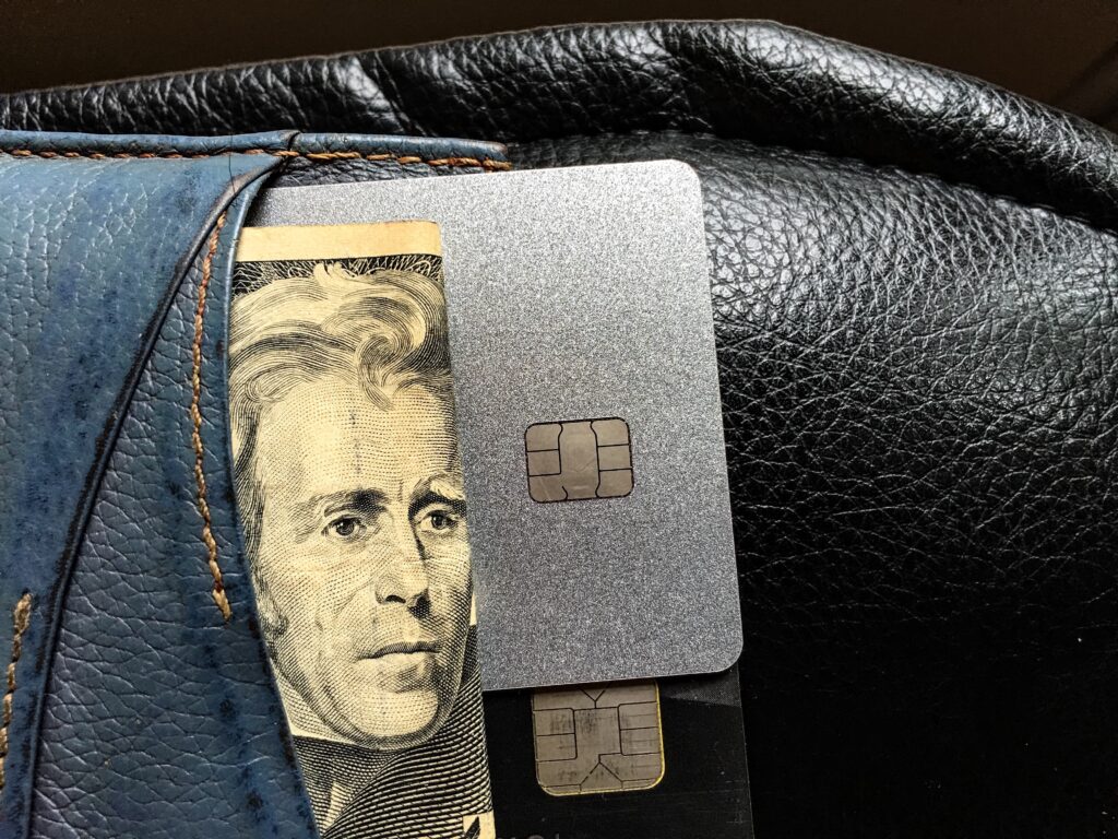 credit card with chip showing in wallet