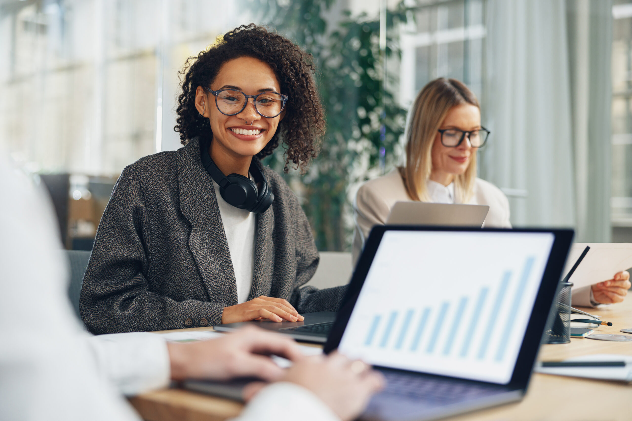 woman looking at financial on a laptop