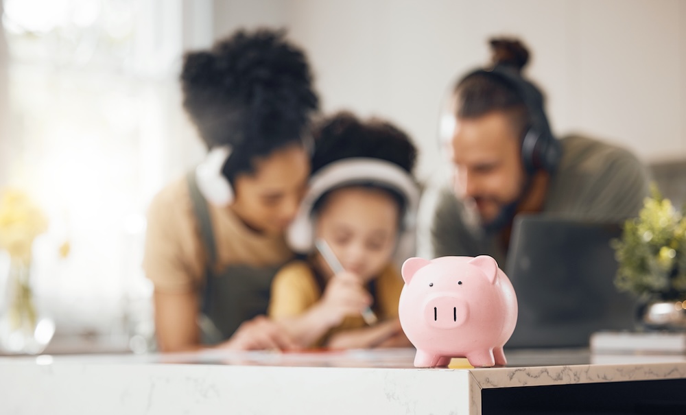 middle class family saving in a piggy bank