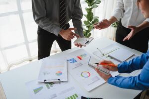 Business people working together on financials