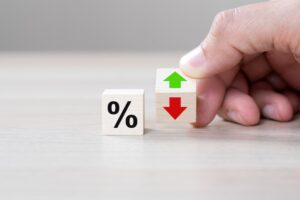 block with percentage and block with arrows going up and down